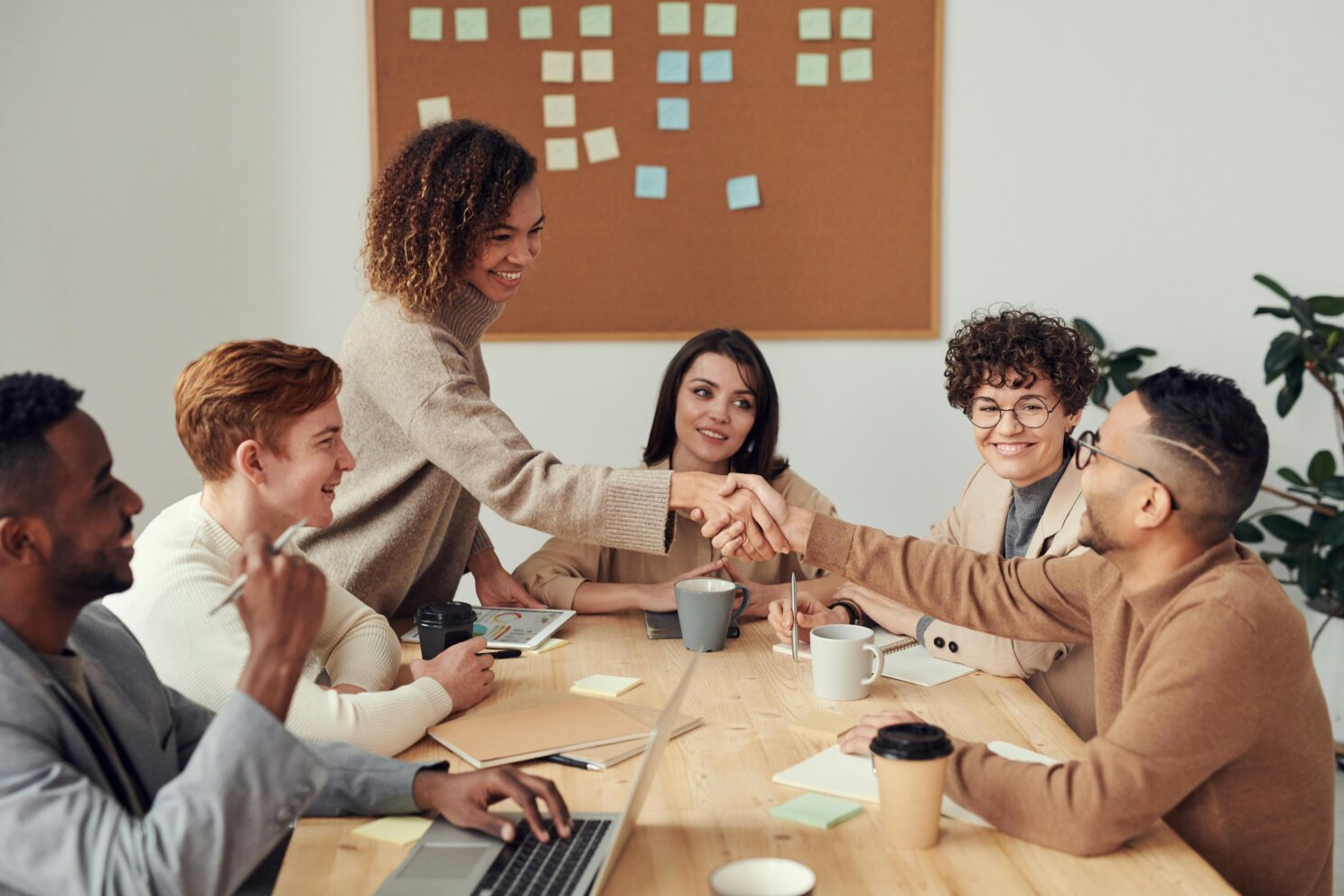 Group of employees collaborating in the workplace.
