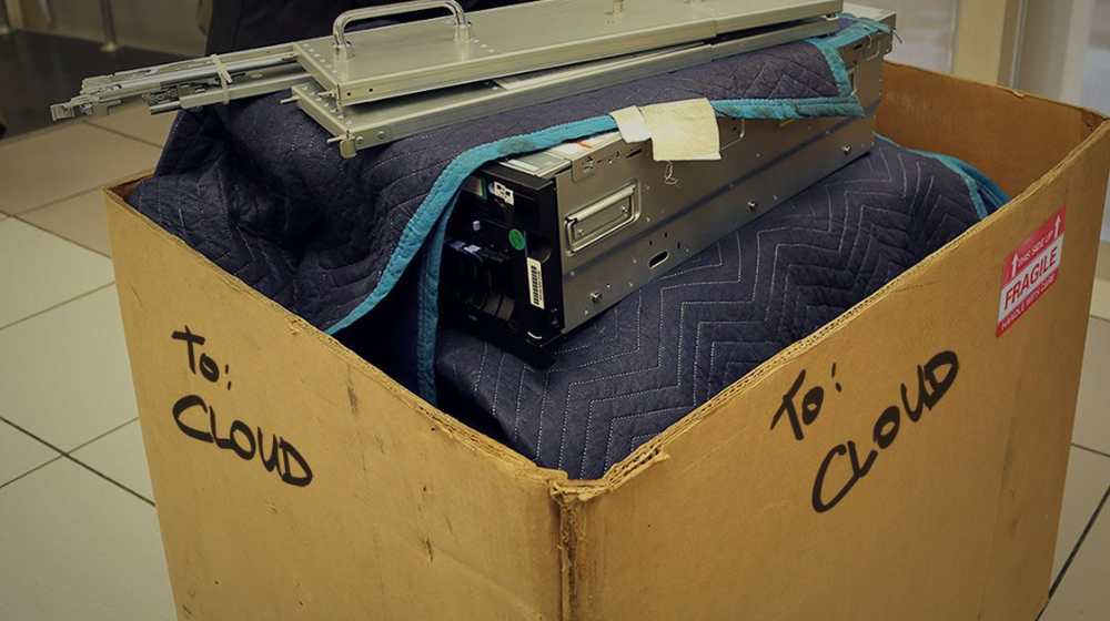 A server packed in a moving box labeled "To: Cloud"